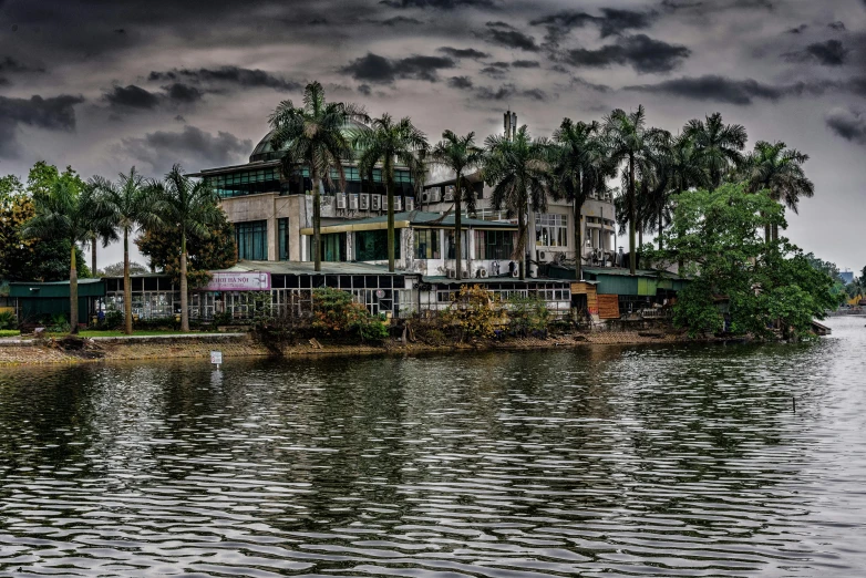 this is an old pograph of a cloudy sky over water