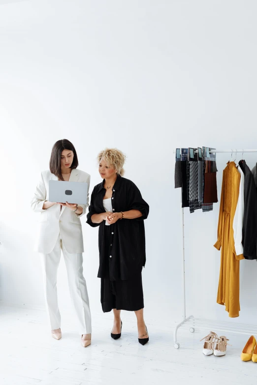 a couple of women standing next to each other