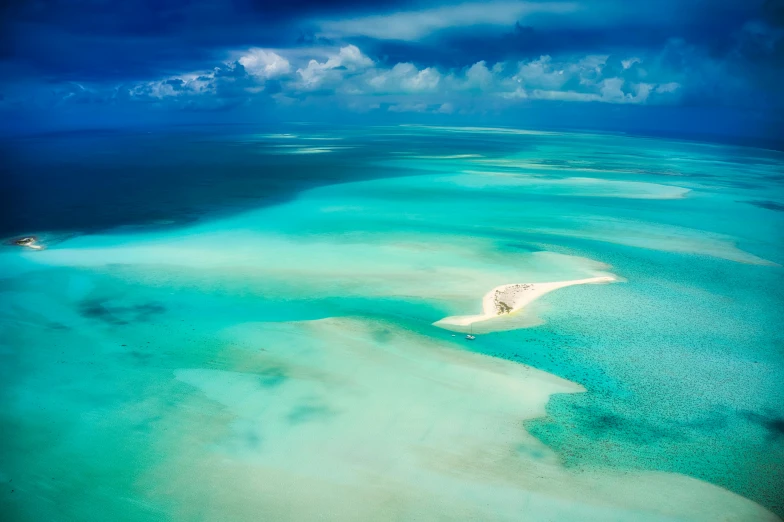 this is an aerial po of the ocean and sandbars