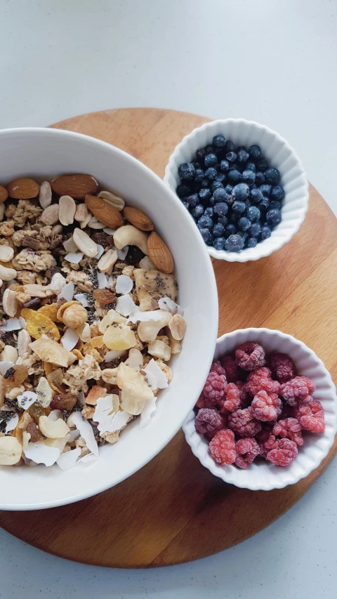 fruit, nuts, and blueberries in a bowl