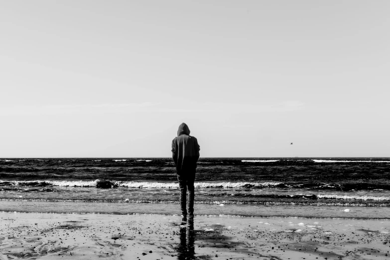 the person is looking out on the ocean at the ocean