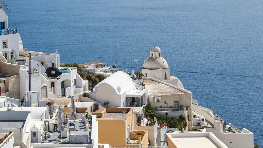 a large white building near the water