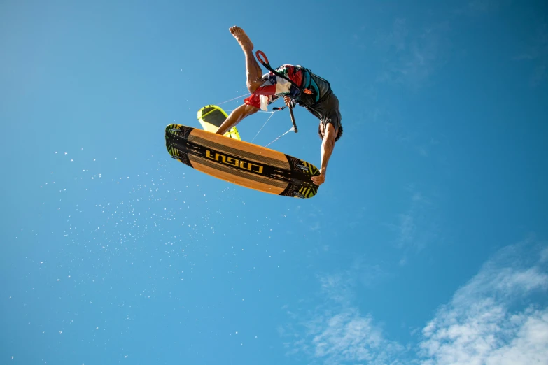 a man riding a snowboard while wearing a helmet