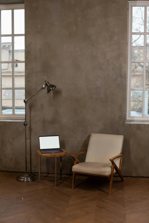 a room with a table, chair and window