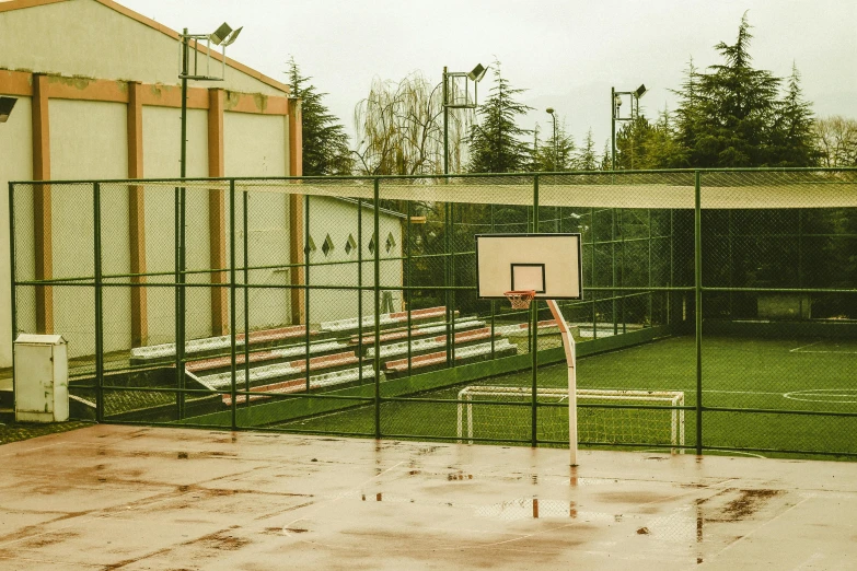 a basketball court with a net on the outside