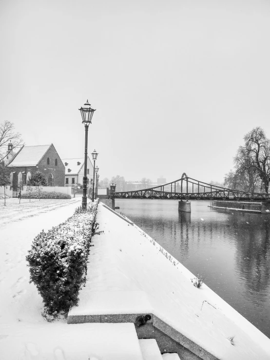 an image of a snow covered river during the day