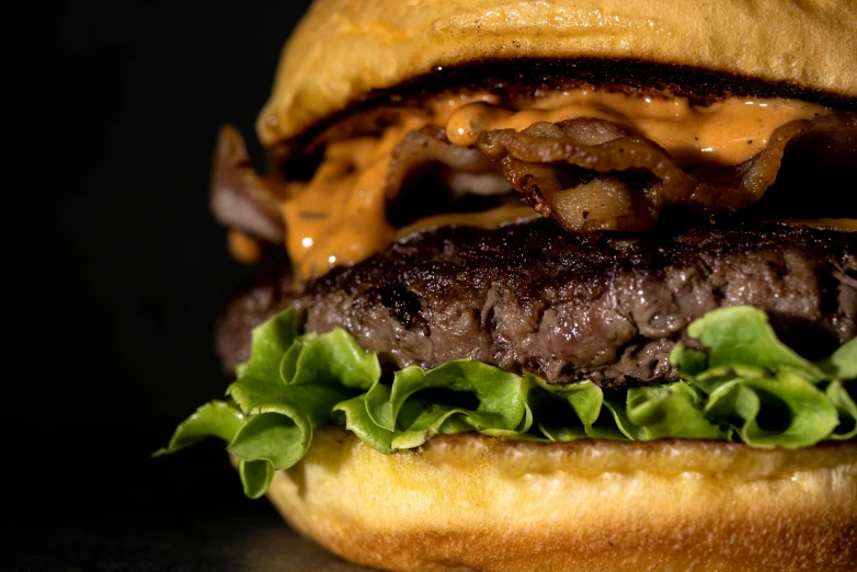 this hamburger is very big and delicious and the beef is ready to be eaten