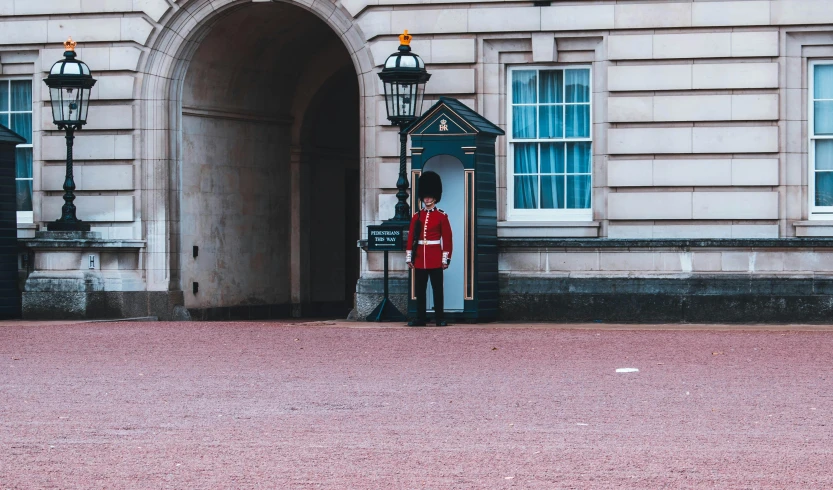 a guards guard standing at the door to a building