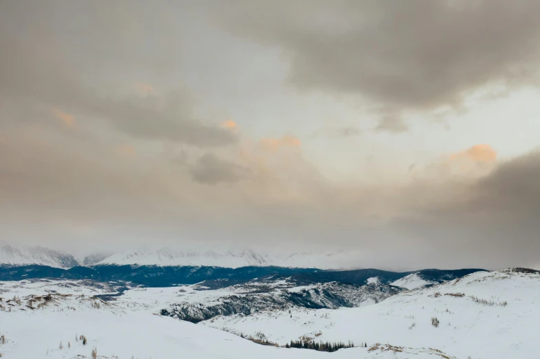 a scenic mountain scene is shown in the foreground