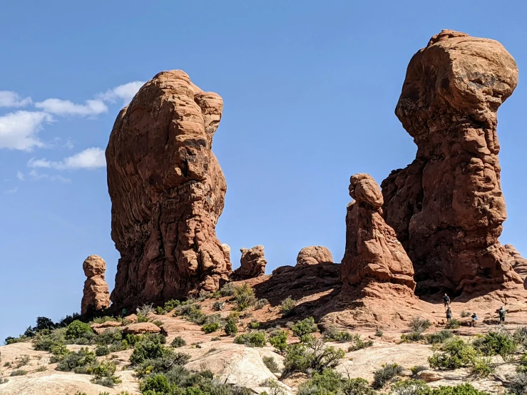 a couple of big rocks in the middle of a mountain