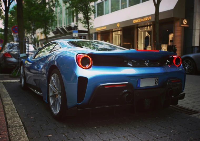 this is a closeup of a sports car in the parking lot