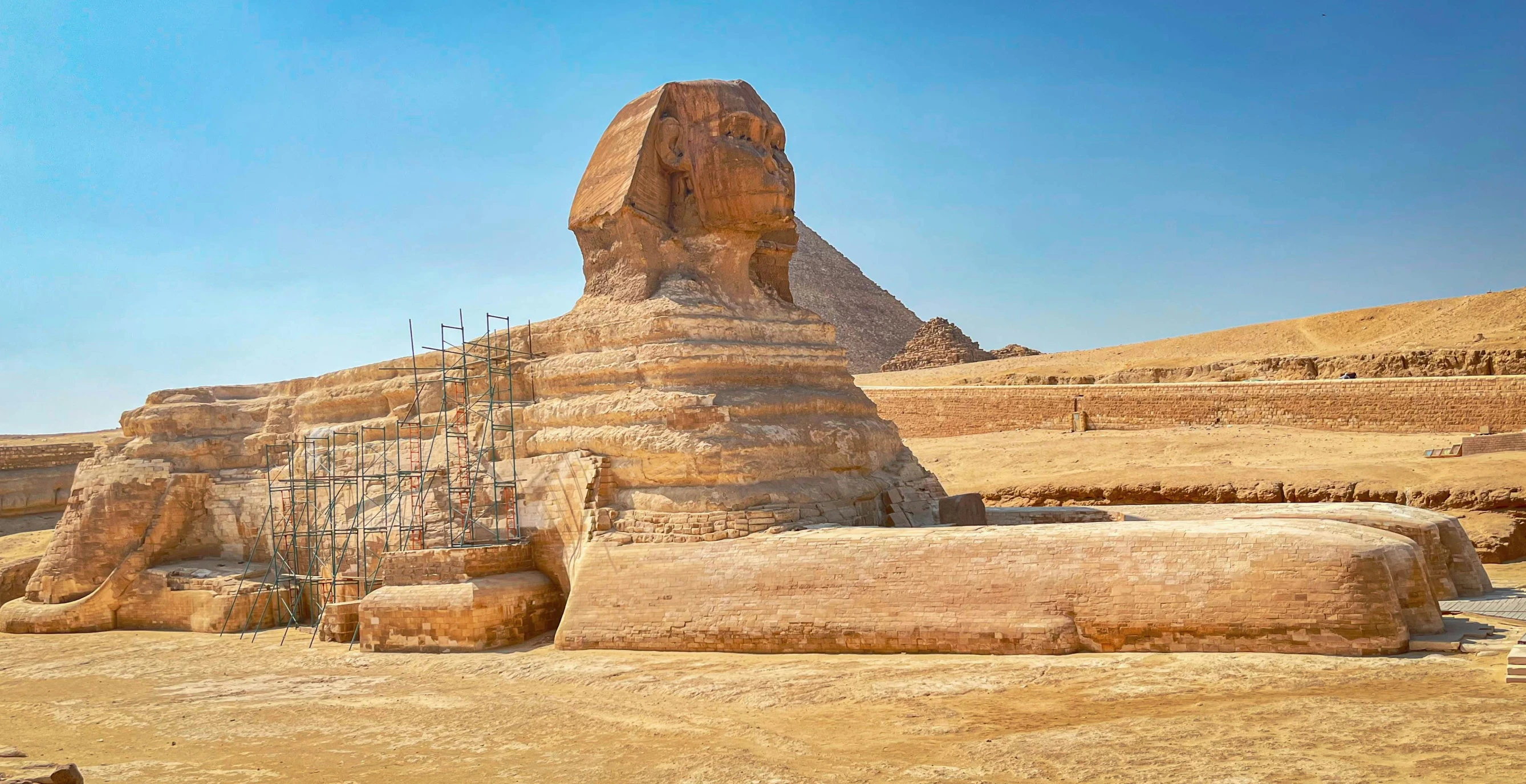 a large stone structure in the middle of the desert