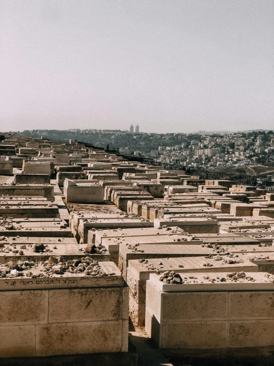 a very large cemetery next to a city