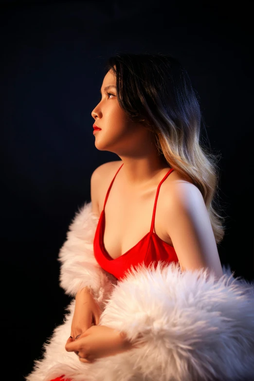 a woman in red and white posing for the camera