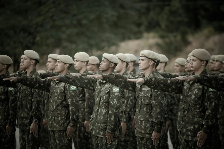 a group of military people that are standing together