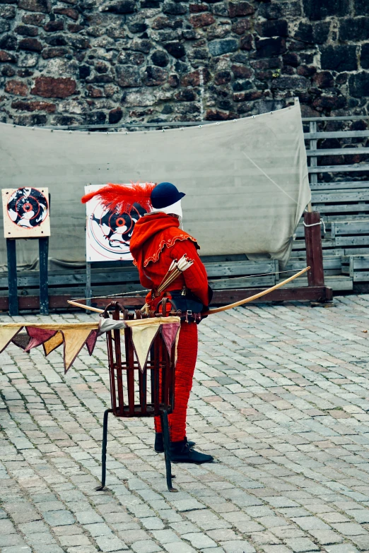 a small display of a man on a stool