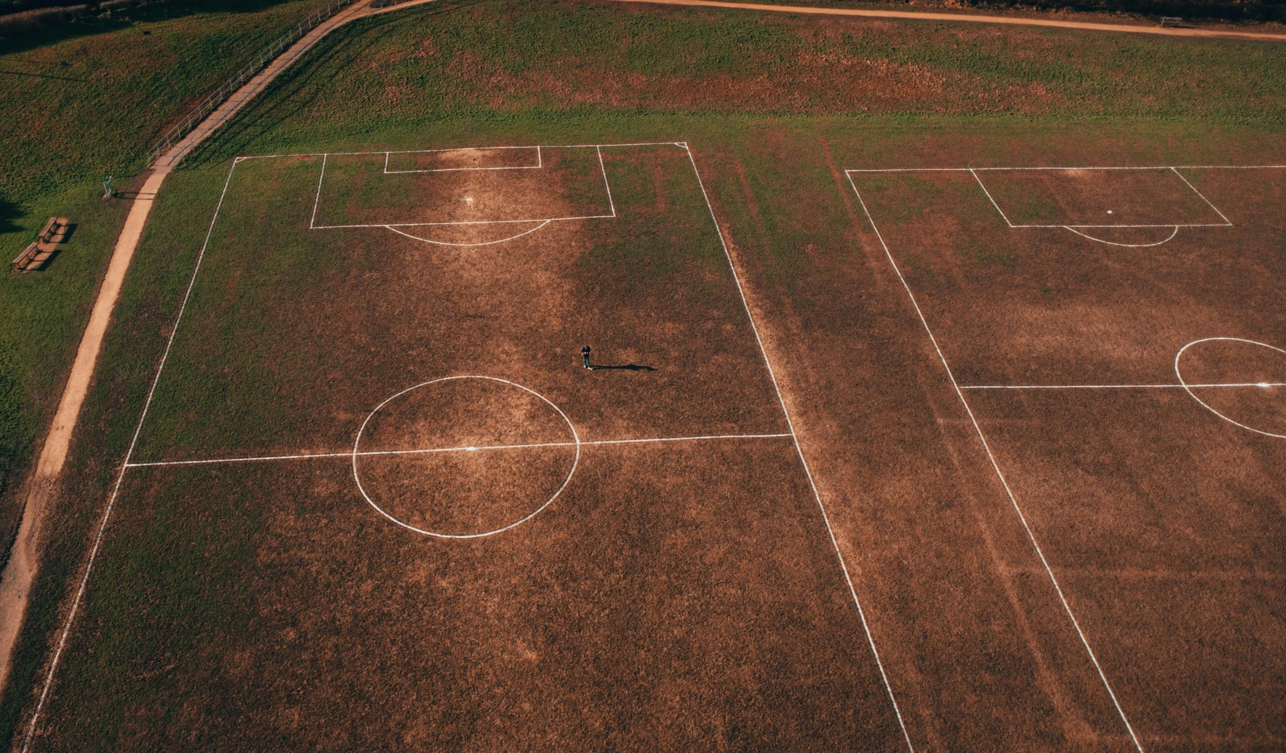 a soccer field in an area that looks like it was being built with only two lines