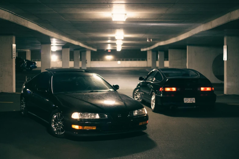 a dimly lit parking garage is very narrow