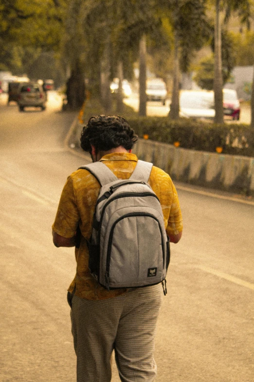 a person riding on a skateboard in the road