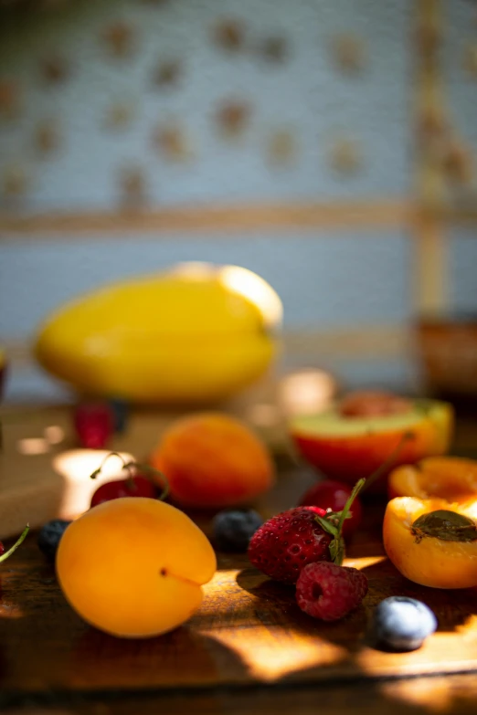 a couple of oranges sitting on a  board