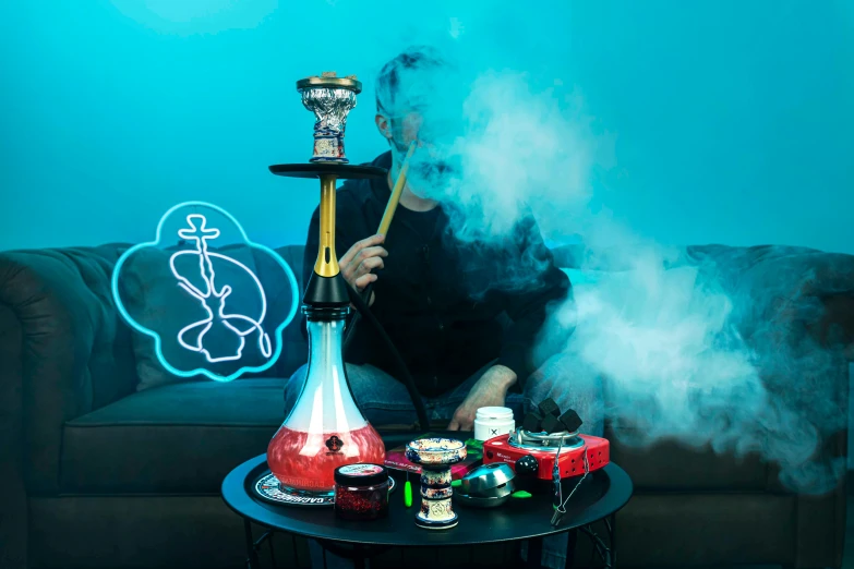 a woman sitting on a couch surrounded by smoke and different types of alcohol