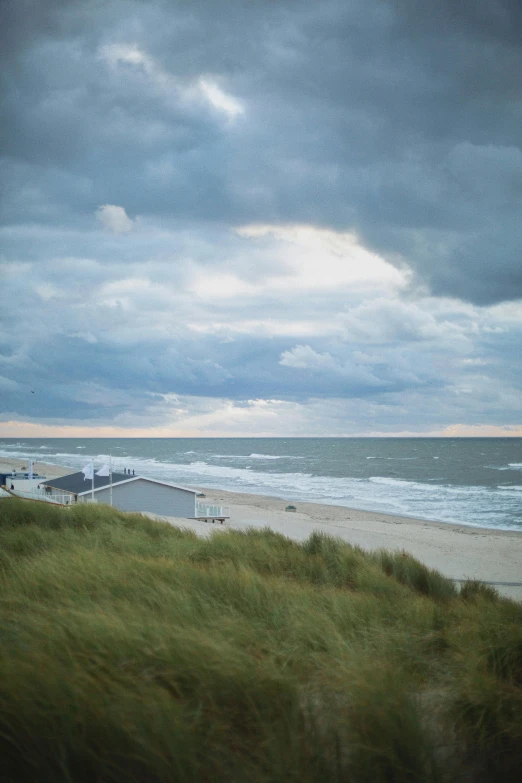 the view of the beach and a cloudy sky