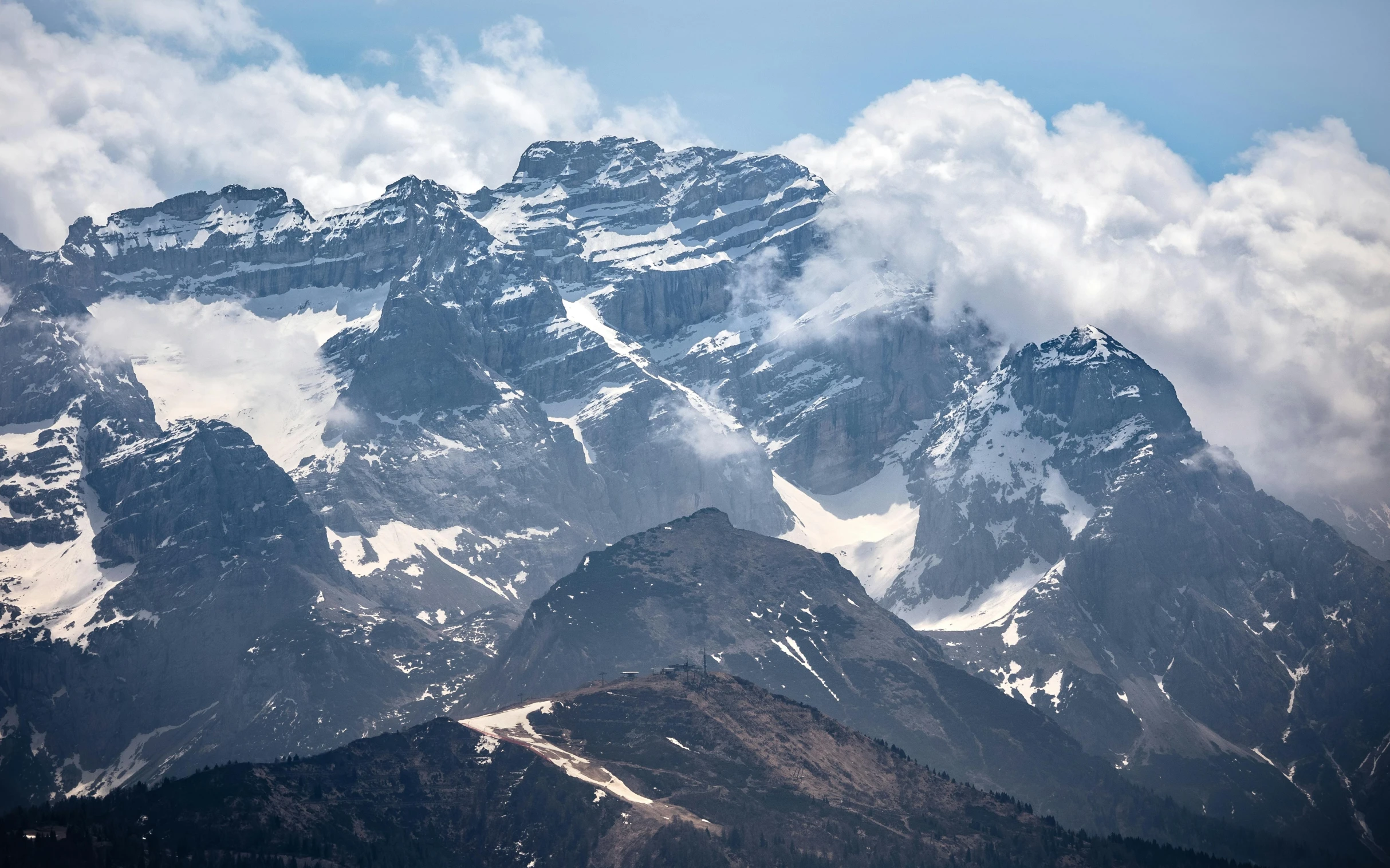 there are some very high mountains with snow on them