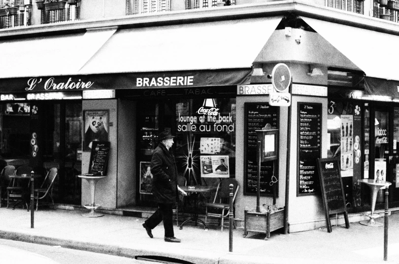 a shopfront at the corner of a sidewalk