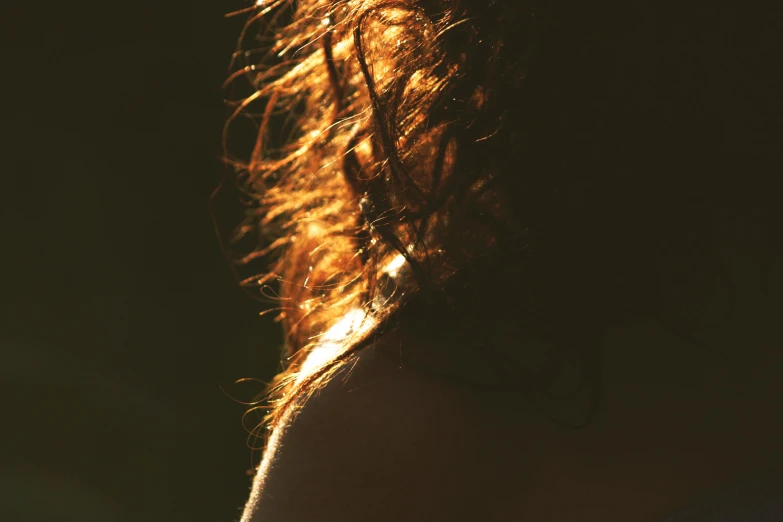 a woman is shown with the light behind her