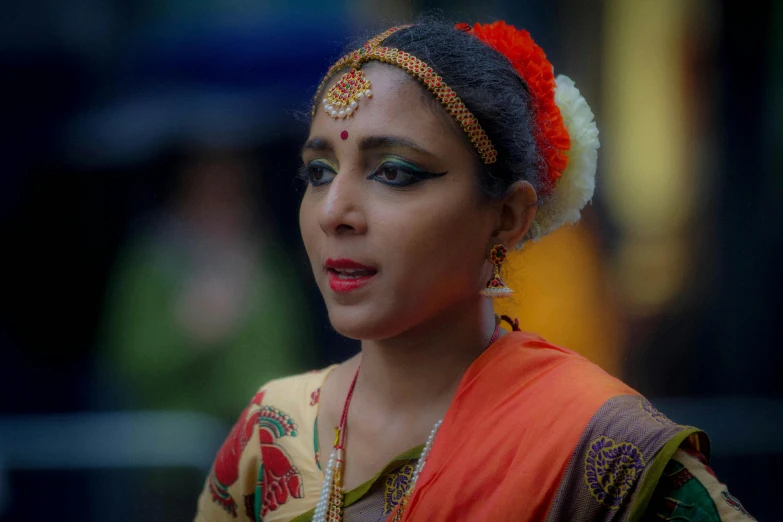 a woman with a colorful make - up on her face