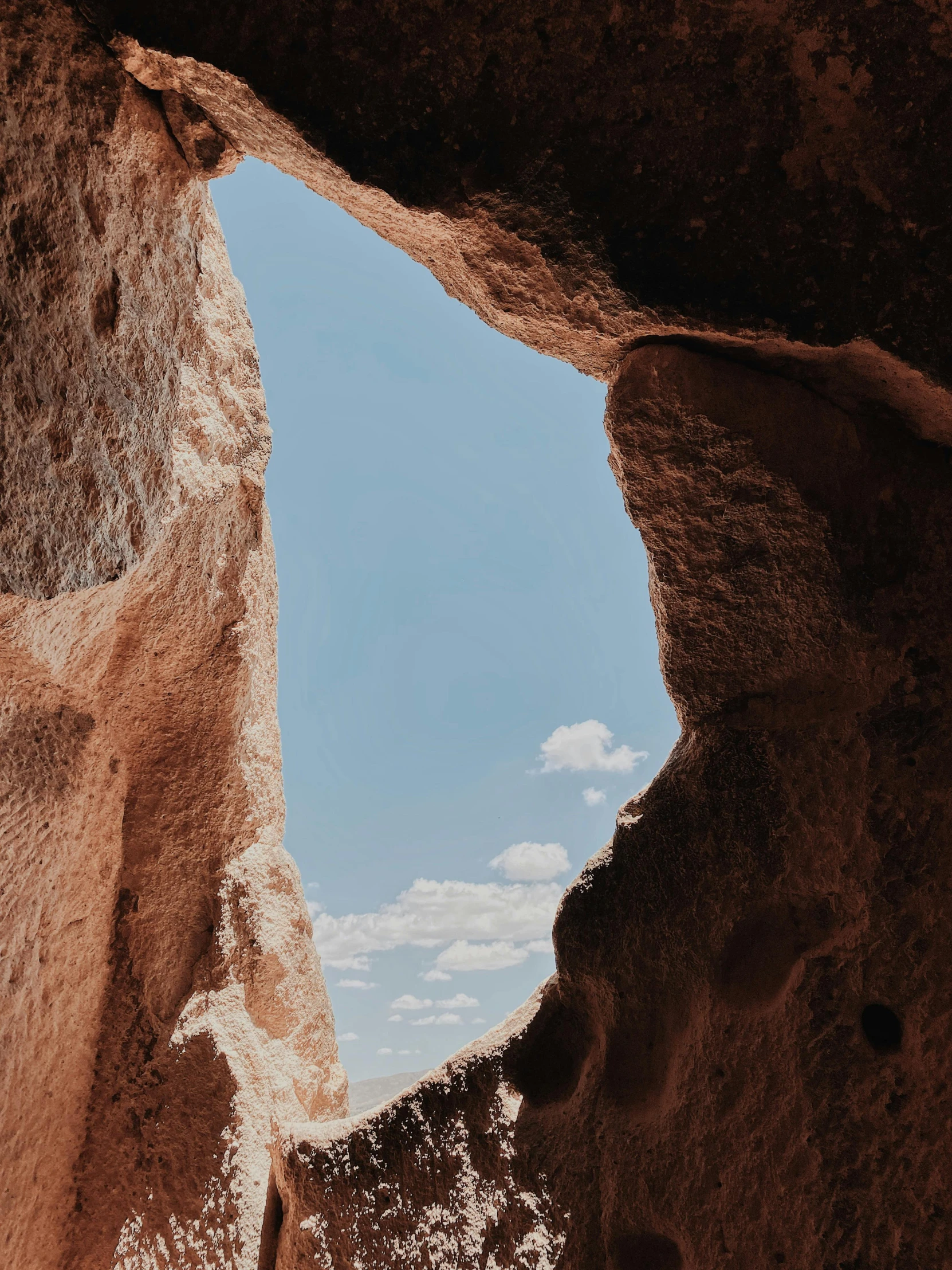 the view from below of a rock formation