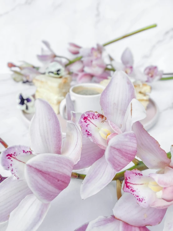 a close up of a flower arrangement on a table