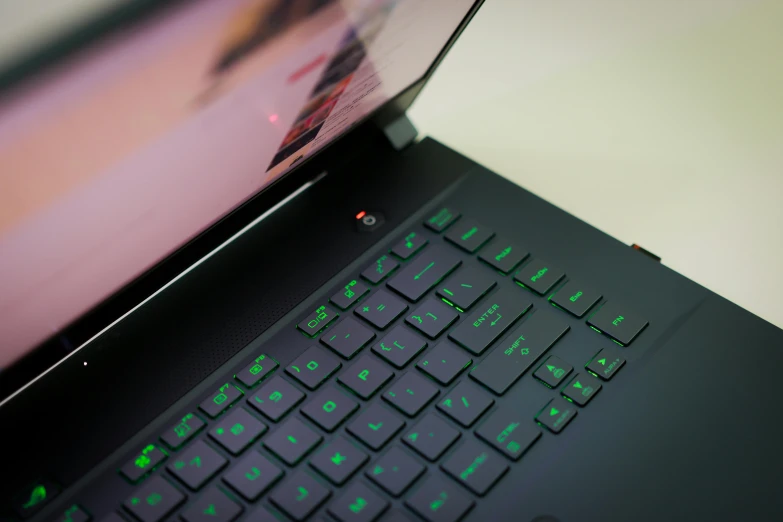 a computer keyboard with a small screen on it