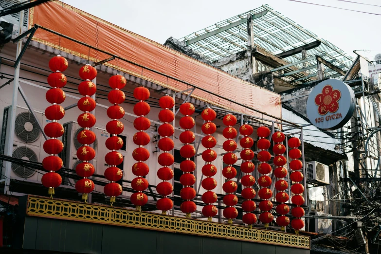 there are many lanterns with chinese writing on them