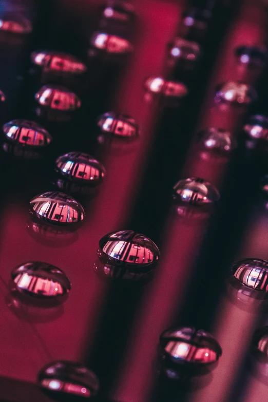 closeup view of an old typewriter with shiny beads