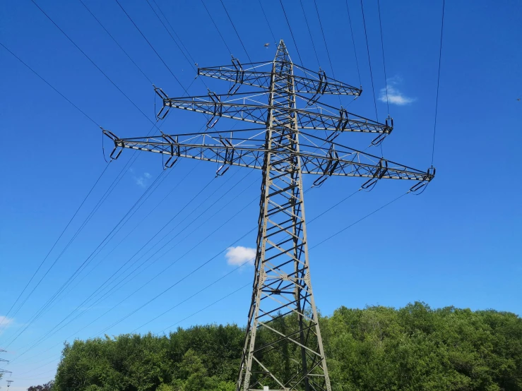 the power lines in a rural area, with a lot of wires on top of it