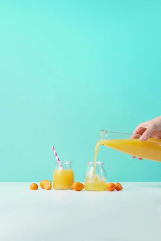 two mason jars with lemonade and orange juice