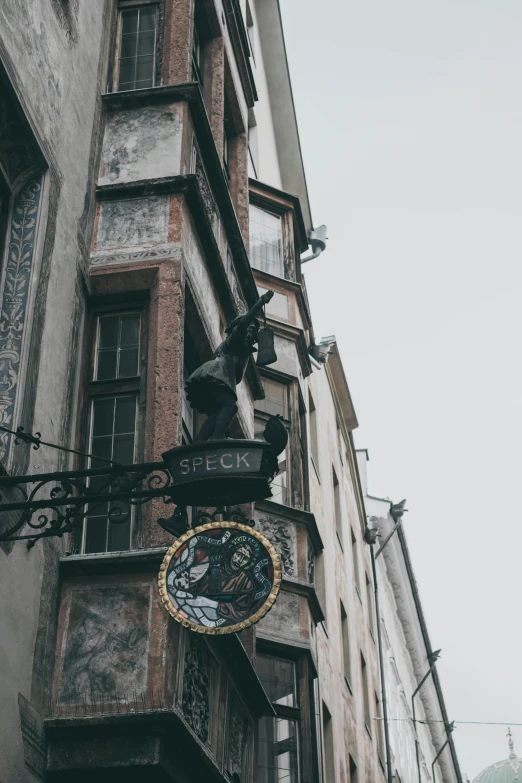 a close up of a street sign in the city