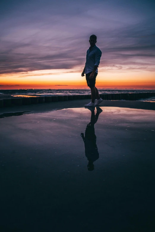 a person running at sunset on a beach