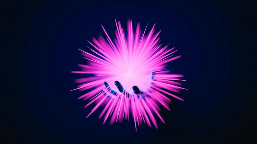 there is a bright blue and pink exploding object in the air