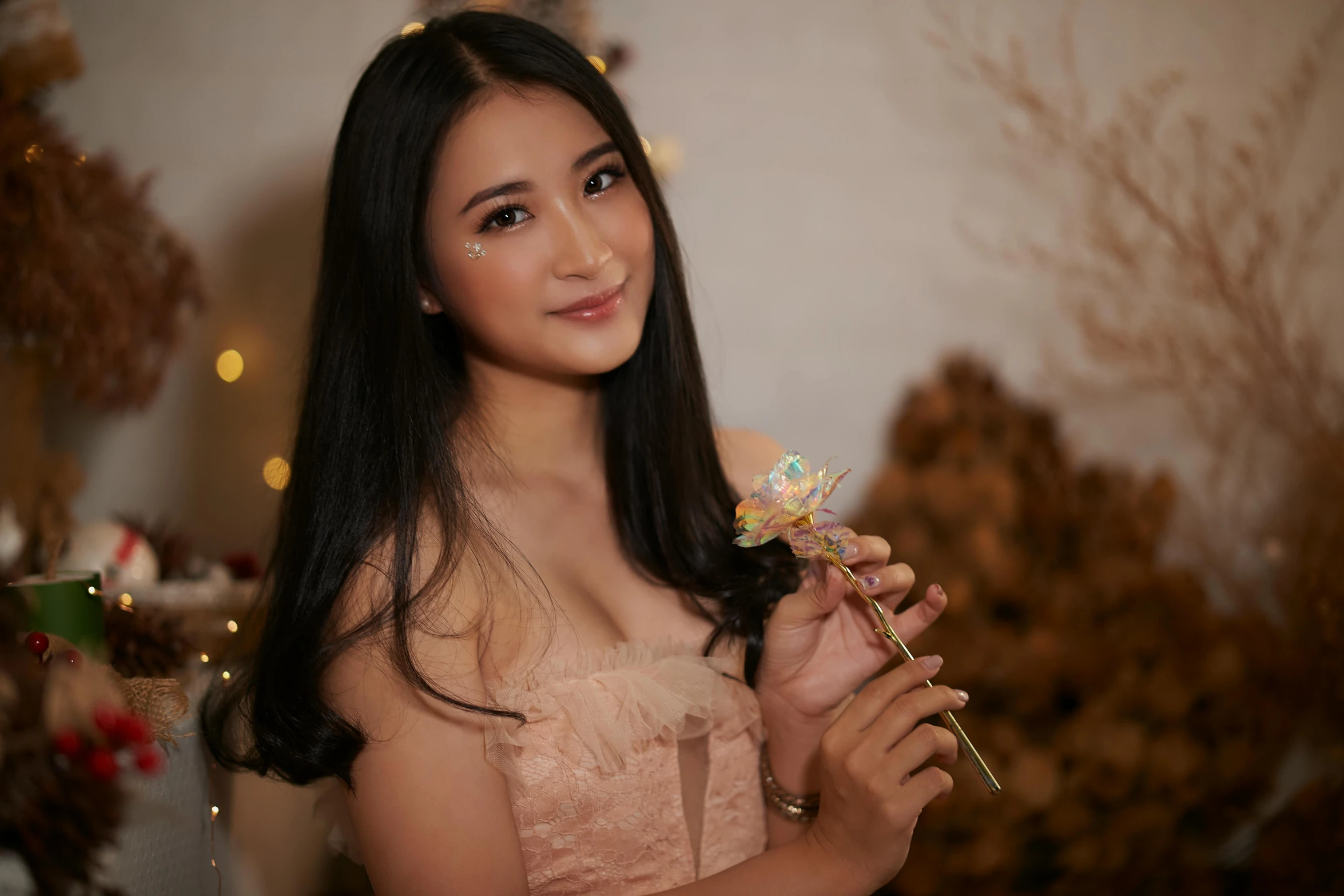 a very young woman with some pretty flowers