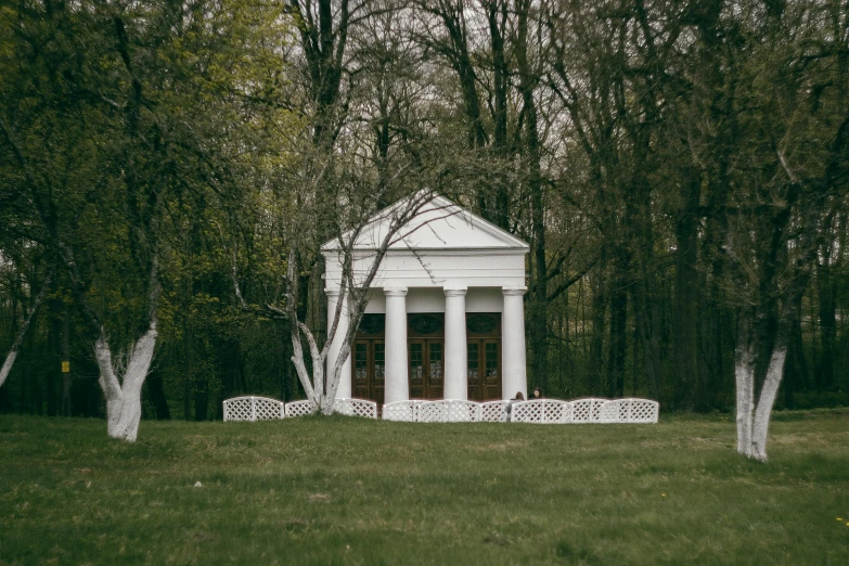 a gazebo in the middle of a park