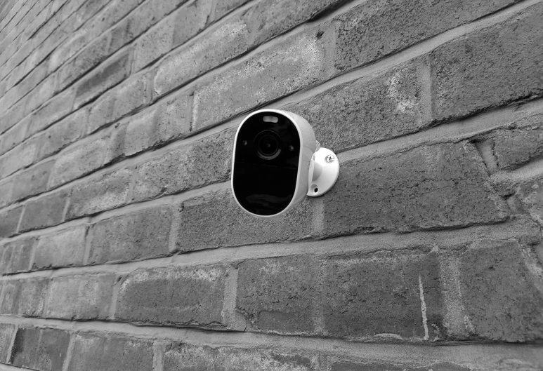 an industrial camera mounted on the side of a wall
