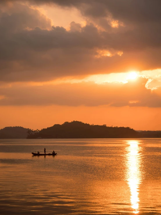 a couple of men that are in a boat