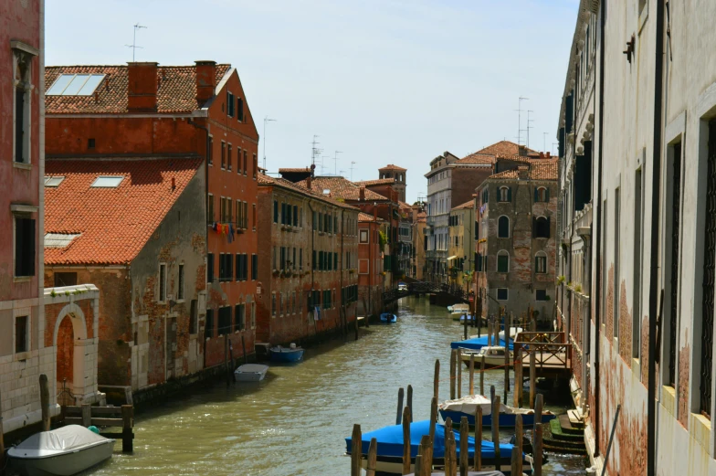 the water runs through the city while the buildings stand tall