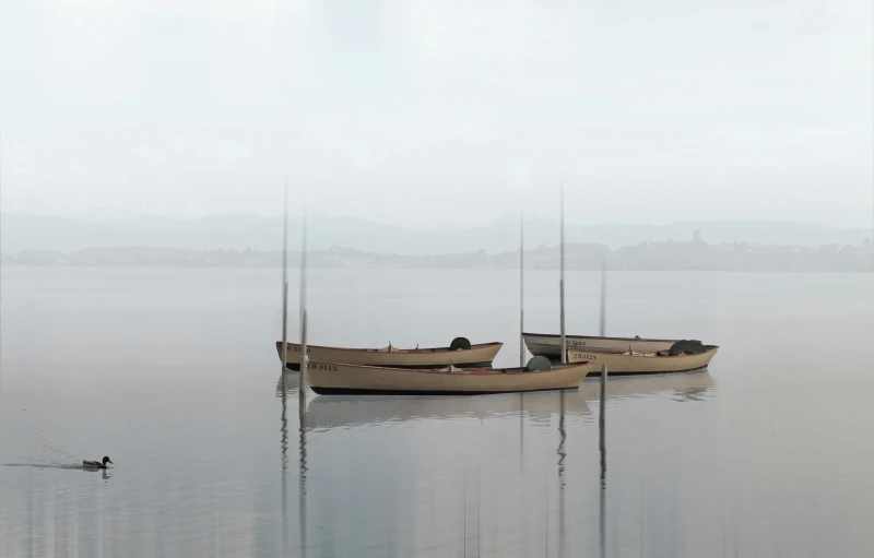 two boats are docked on the calm surface