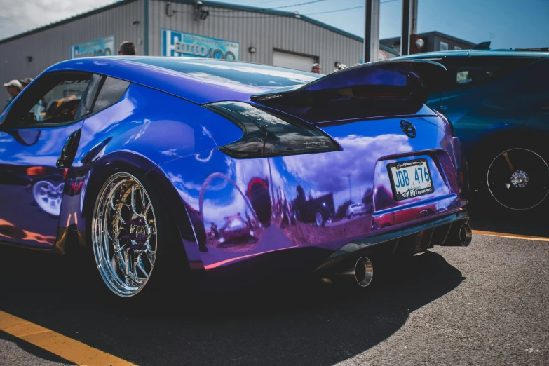 a car with some very colorful paint on it's hood