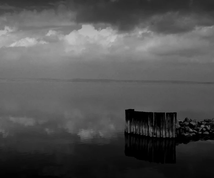 black and white po of a dark body of water