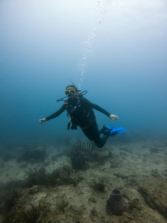 a person swimming underwater in the ocean