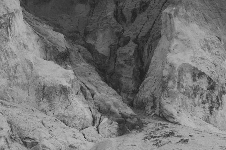 an artistic black and white pograph of some rocky terrain